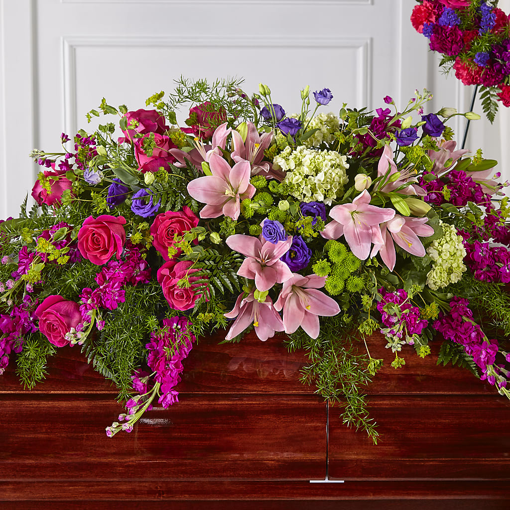 Radiant Tribute Casket Spray – RUTH'S FLOWERS AND GIFTS, Marshfield MO